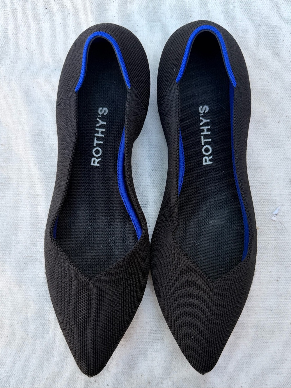 Rothy's Black Pointed Toe Flats with Royal Blue Trim